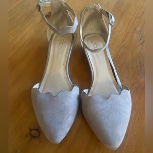 Scalloped edge pointed toe flat (with smallest heel)
